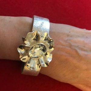 Silver bracelet with flower